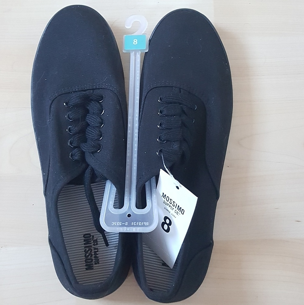 Plain black Keds style lace up low ankle sneakers